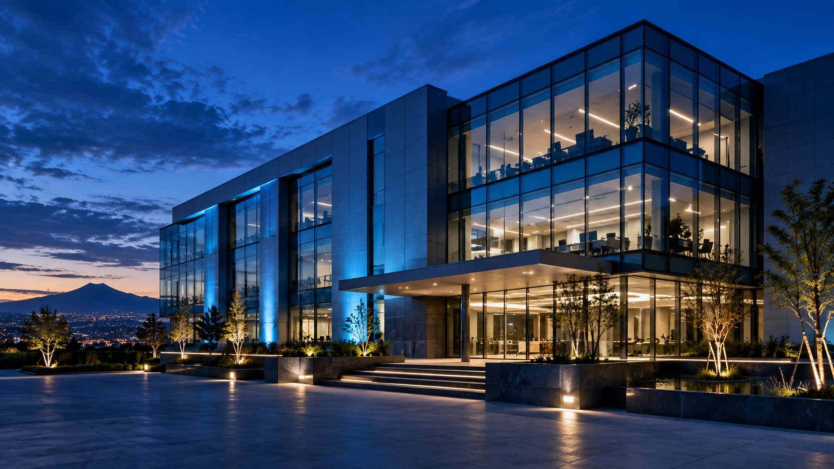 Edificio corporativo tecnológico al anochecer